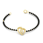 Load image into Gallery viewer, gold-baby-feet-nazariya-bracelet-with-black-beads-mgsbrc11612angle5-nl-yg