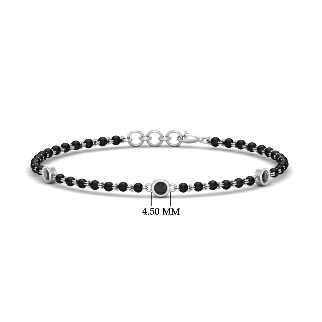 3-stone-bezel-set-black-diamond-mens-station-bracelet-in-white-gold-mgsmbrc11837blackangle1-nl-wg-hw.jpg