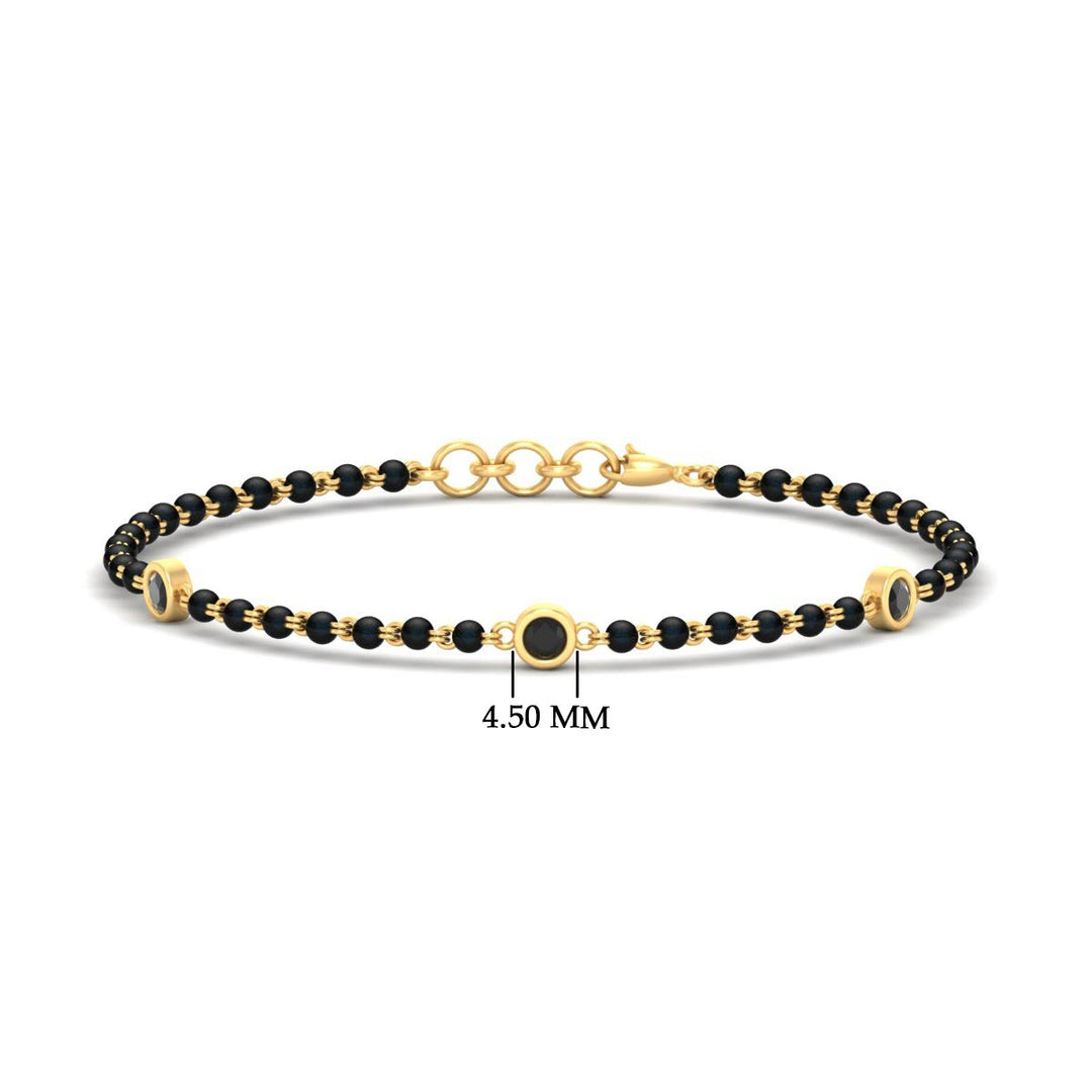 3-stone-bezel-set-black-diamond-mens-station-bracelet-in-yellow-gold-mgsmbrc11837blackangle1-nl-yg-hw.jpg