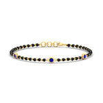 Load image into Gallery viewer, 3-stone-bezel-set-sapphire-mens-station-bracelet-in-yellow-gold-mgsmbrc11837gsablangle1-nl-yg.jpg