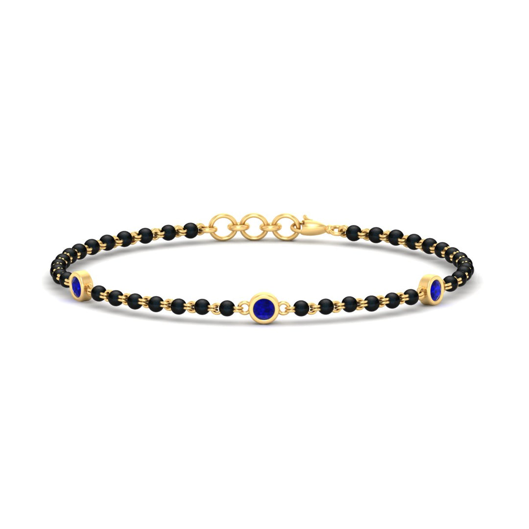 3-stone-bezel-set-sapphire-mens-station-bracelet-in-yellow-gold-mgsmbrc11837gsablangle1-nl-yg.jpg