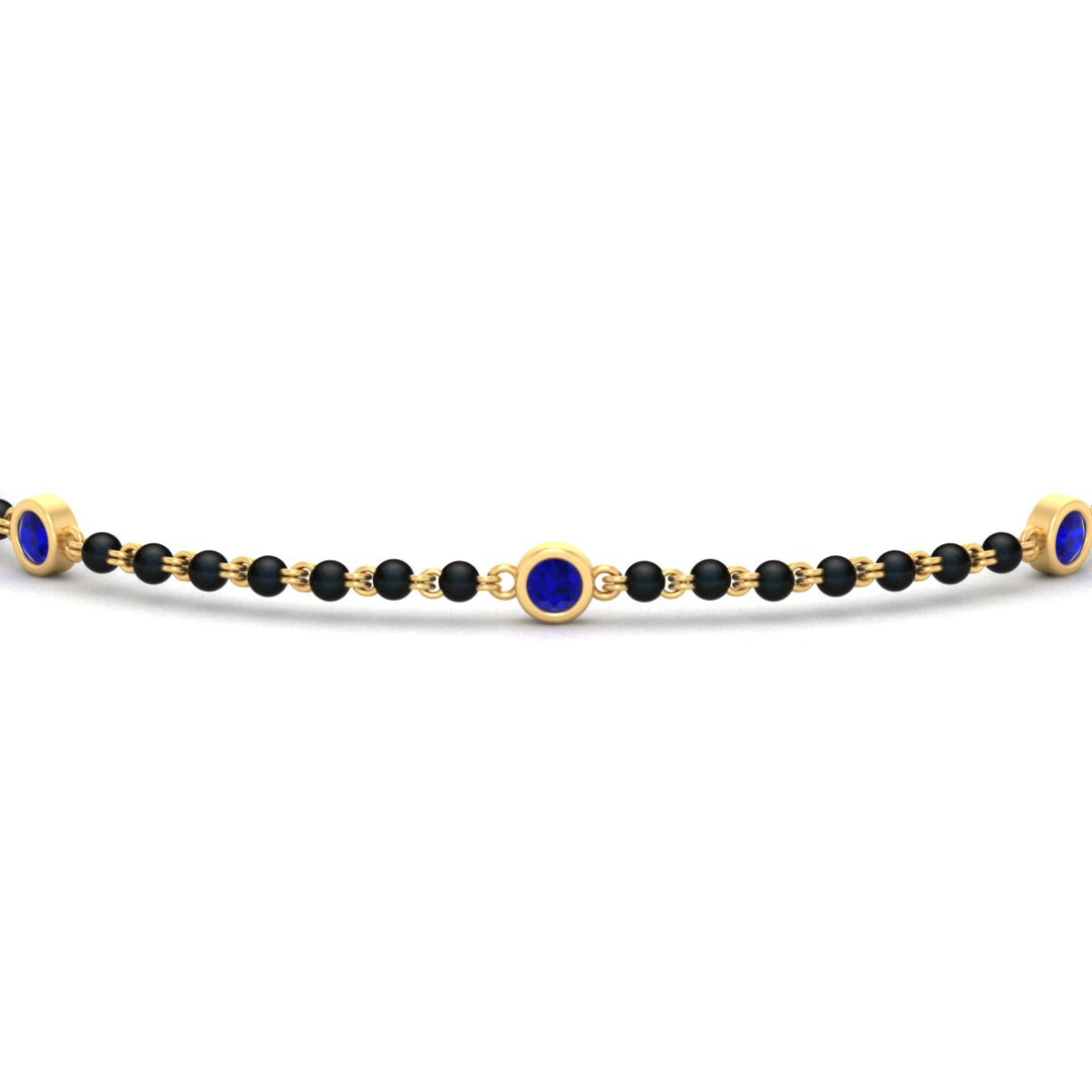3-stone-bezel-set-sapphire-mens-station-bracelet-in-yellow-gold-mgsmbrc11837gsablangle5-nl-yg.jpg