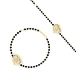 Load image into Gallery viewer, gold-baby-feet-nazariya-bracelet-with-black-beads-mgsbrc11612angle3-nl-yg