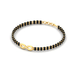 Load image into Gallery viewer, nfinity-design-mens-black-bead-mangalsutra-bracelet-in-yellow-gold-mgsmbrc11841angle2-nl-yg.jpg?v=1789015536