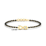 Load image into Gallery viewer, infinity-knot-diamond-mens-mangalsutra-hand-bracelet-in-yellow-gold-mgsmbrc11839angle1-nl-yg-hw.jpg