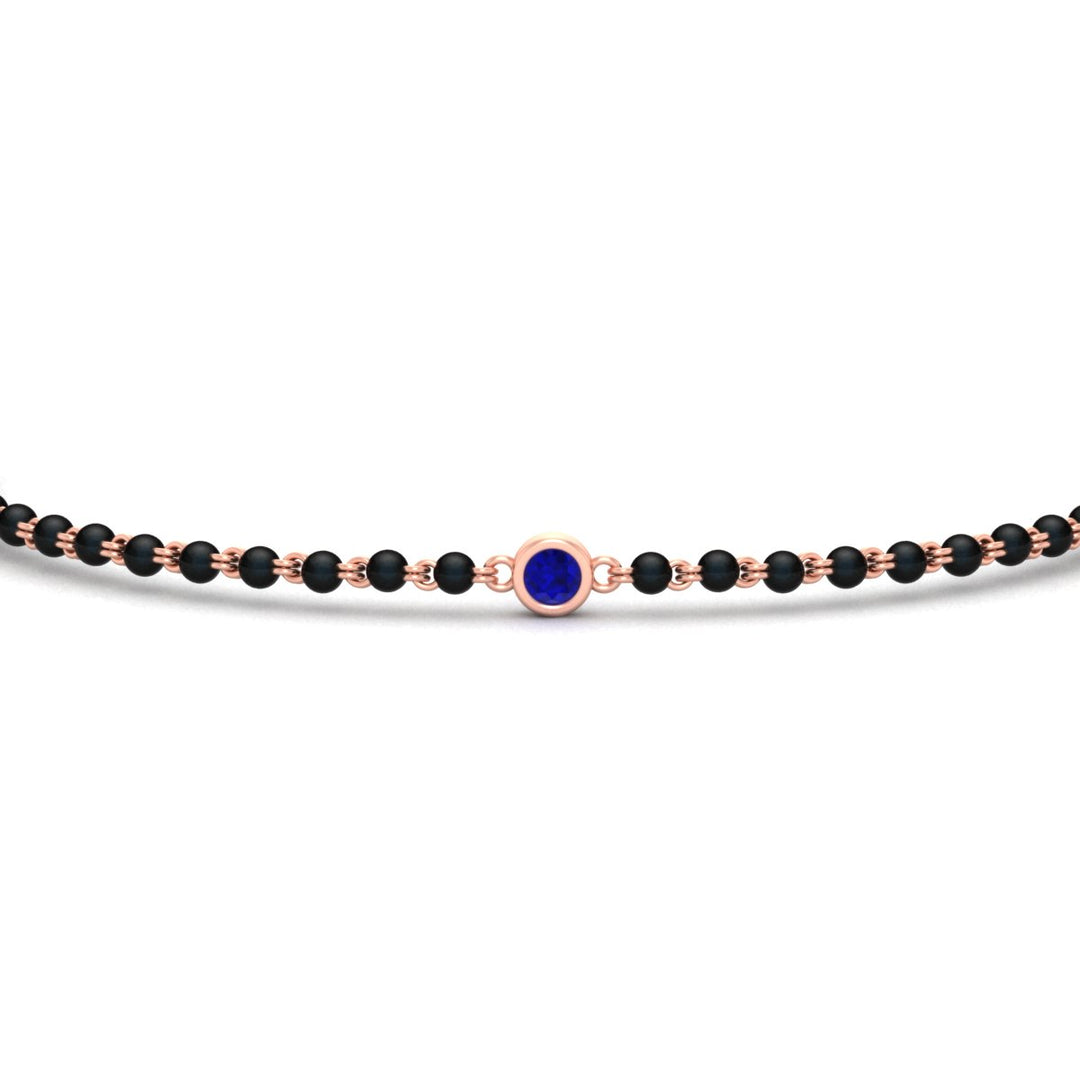mens-single-bezel-set-sapphire-mangalsutra-bracelet-in-rose-gold-mgsmbrc11836gsablangle5-nl-rg.jpg