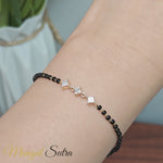 Load and play video in Gallery viewer, 3-stone-bracelet-mangalsutra-with-beads-in-yellow-gold-MGBRC8651-720