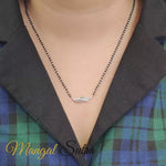 Load and play video in Gallery viewer, Swirl Diamond Necklace Mangalsutra
