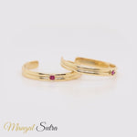 Load and play video in Gallery viewer, Double-Line-Ruby-Toe-Rings-in-yellow-gold-720 
