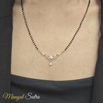 Load and play video in Gallery viewer, diamond-drop-mangalsutra-necklace-in-yellow-gold-720